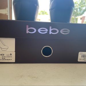 BeBe Women’s black platform/stiletto